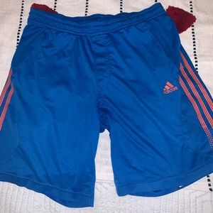 Adidas blue and orange athletic shorts